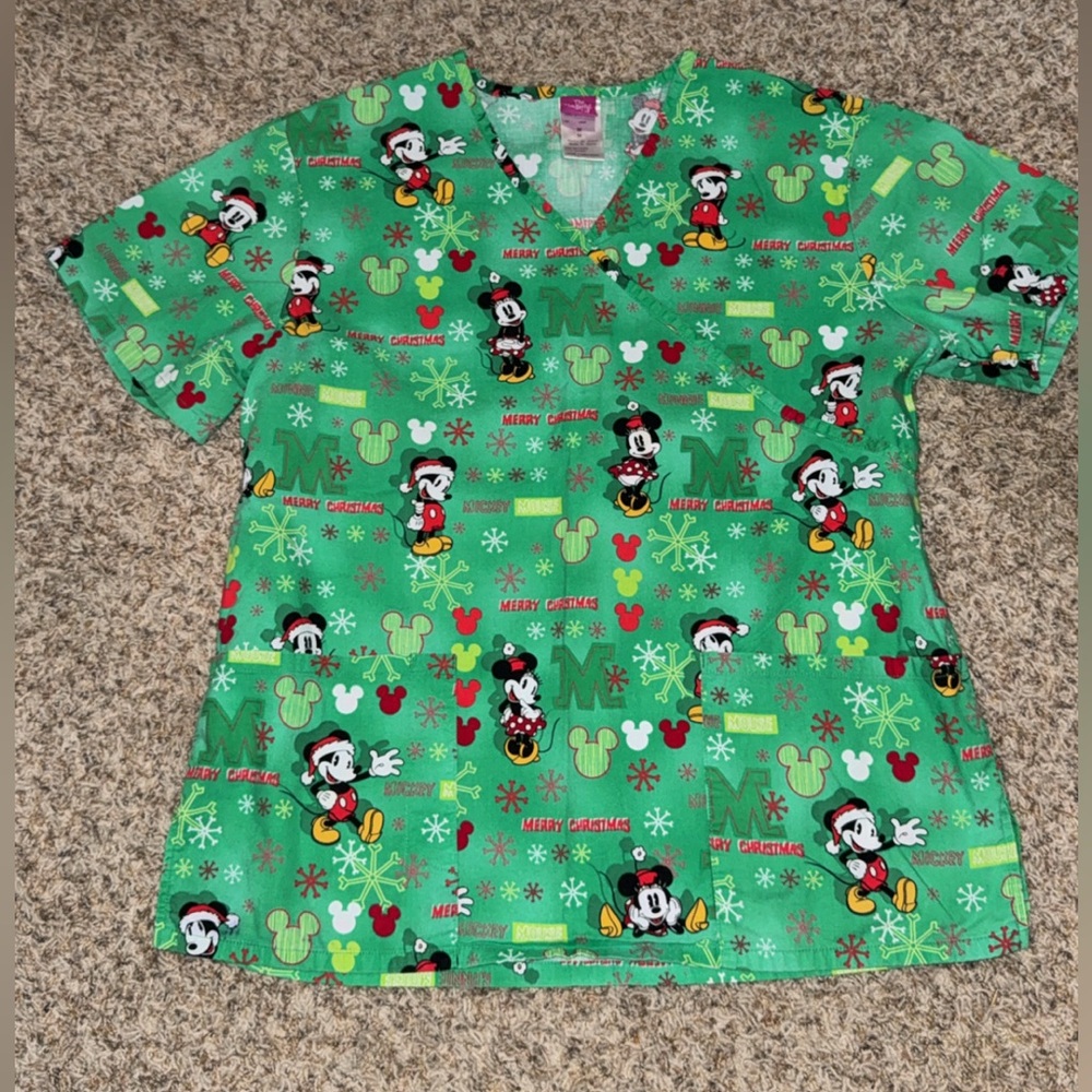 green Disney "Merry Christmas" scrub top featuring Mickey Mouse